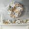 Glitzhome® 24" Pre-Lit Snow Flocked Greenery Pine Poinsettia Christmas Wreath